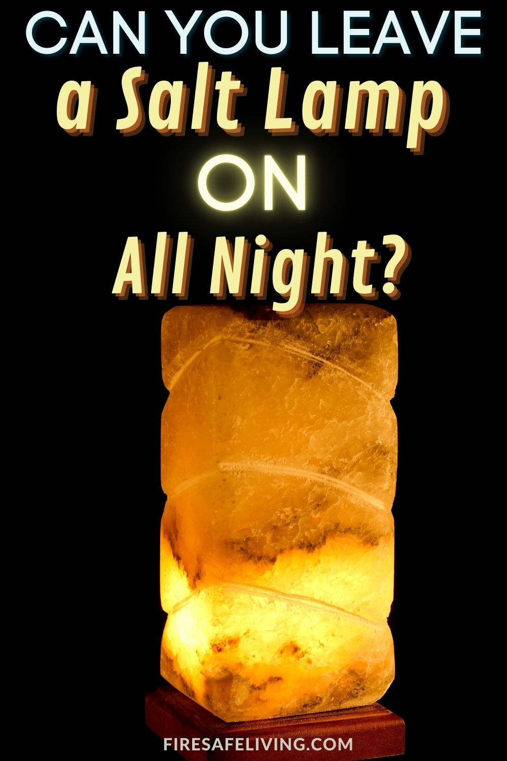A salt lamp turned on in dark background with text overlay that reads Can You Leave a Salt Lamp on All Night